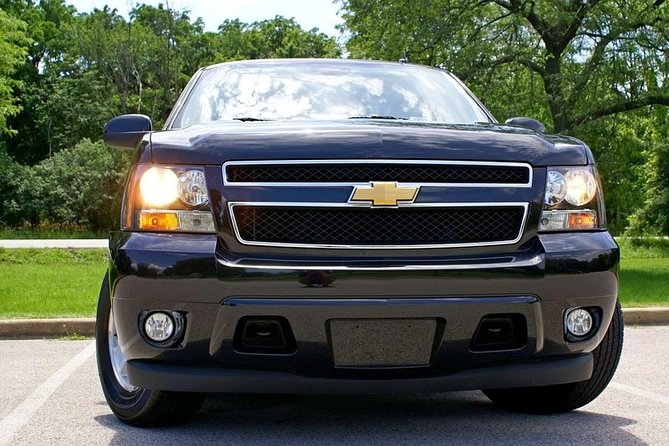 Midway Airport Transfer to Chicago by Luxury SUV - Curbside - Timing in the real world: 30 minutes to 1 hour, plus wait time