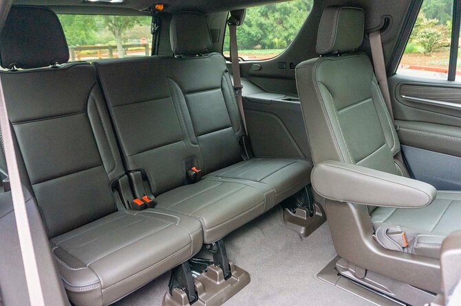 O'Hare or Midway Airport Curbside Transport One Way - The Ride: Luxury SUV Comfort Plus Practical Extras